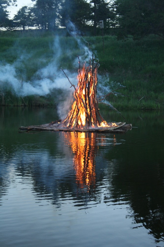 The juhannuskokko, or midsummer bonfire, burned with a lot of smoke during the Finn Fest celebration in Frederick on June 15, 2013.